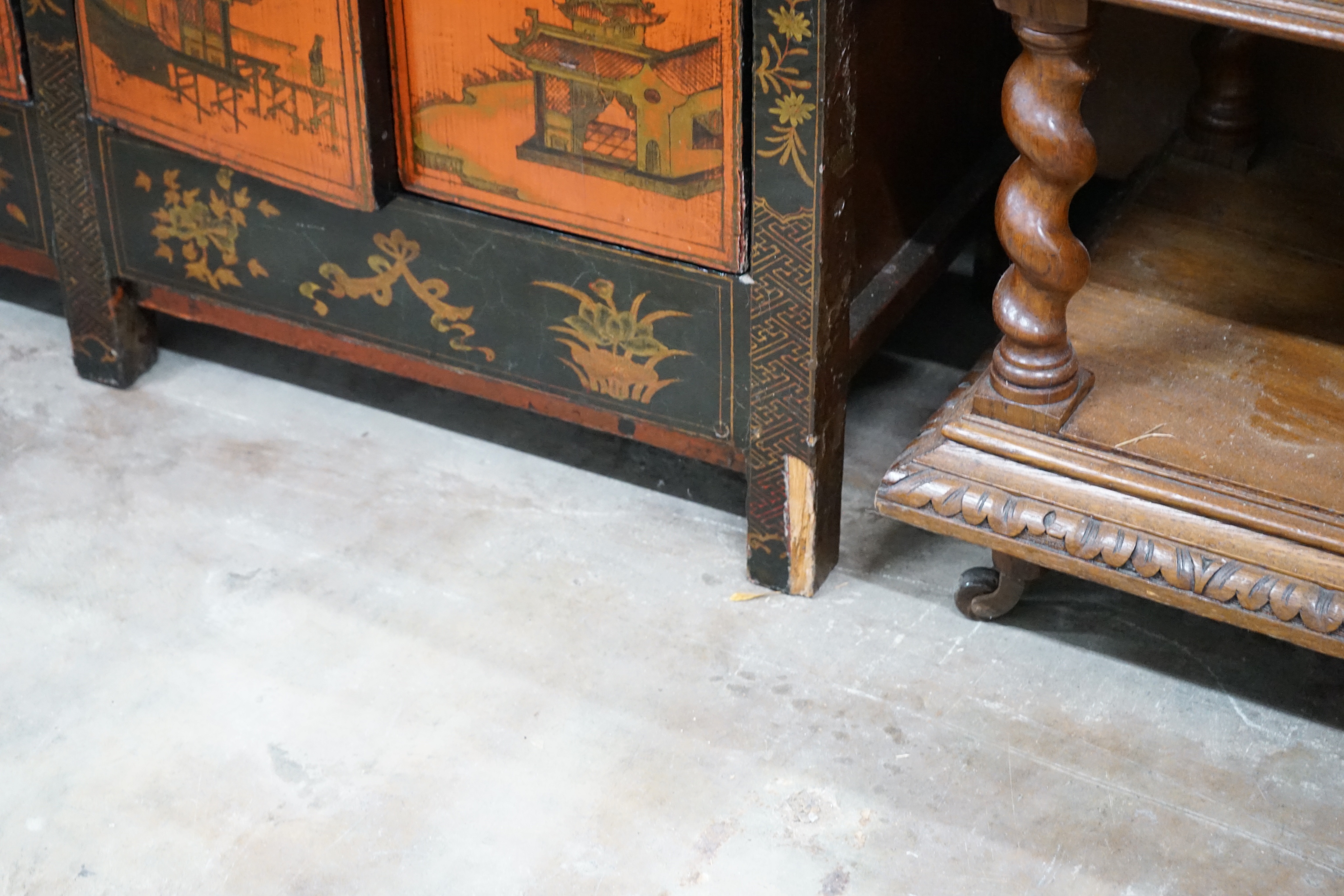 A Chinese lacquered low cabinet, width 112cm depth 41cm height 75cm